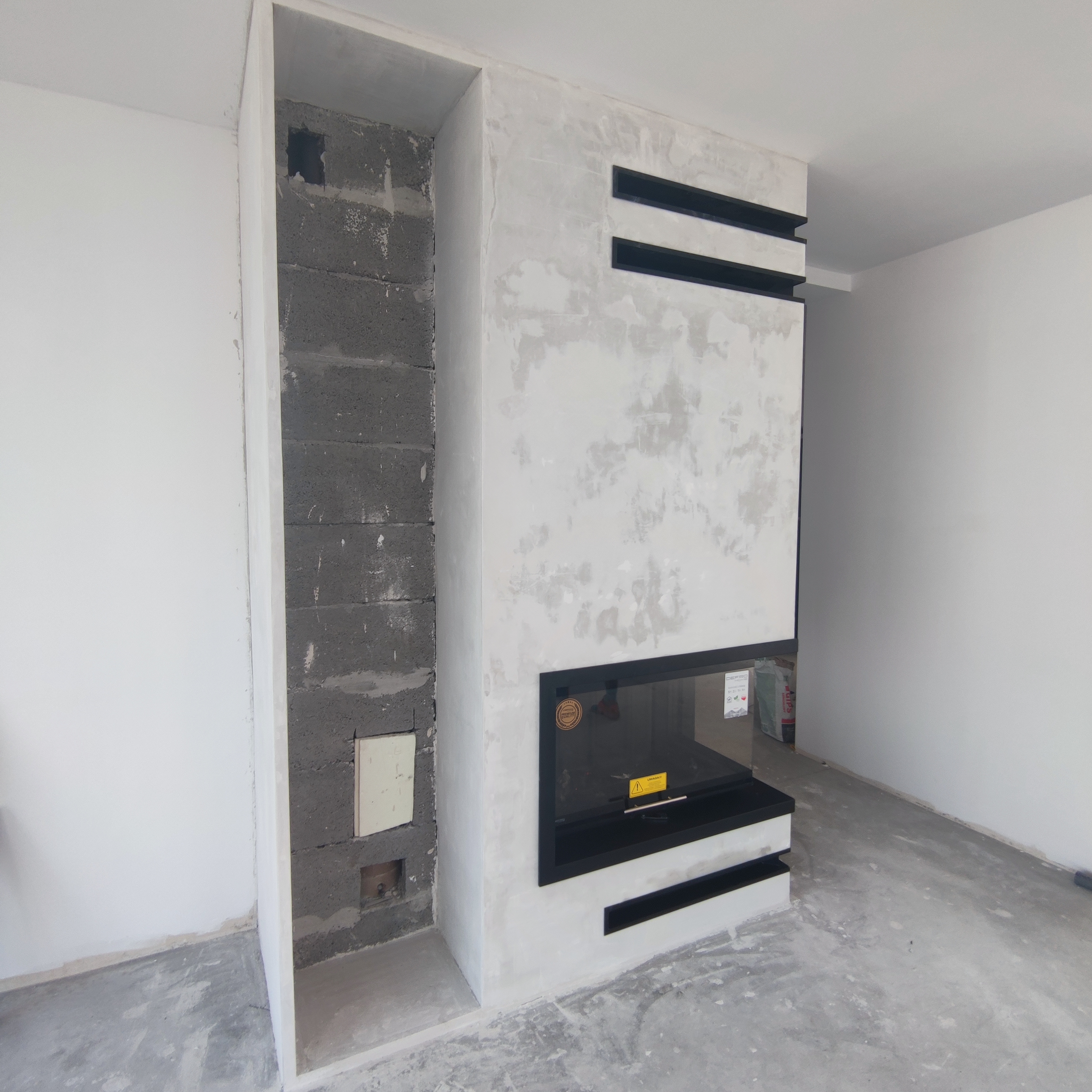 Hybrydowa kotłownia 2026: Jak połączyć pompę ciepła z kominkiem, by nie stracić gwarancji na dom?